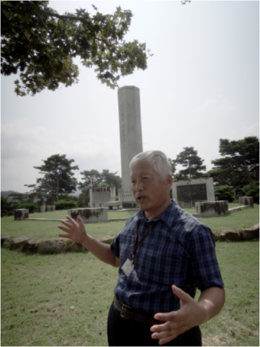 Our museum guide, the great-grandson of a peasant commander, retells the battle of Hwangtohyun